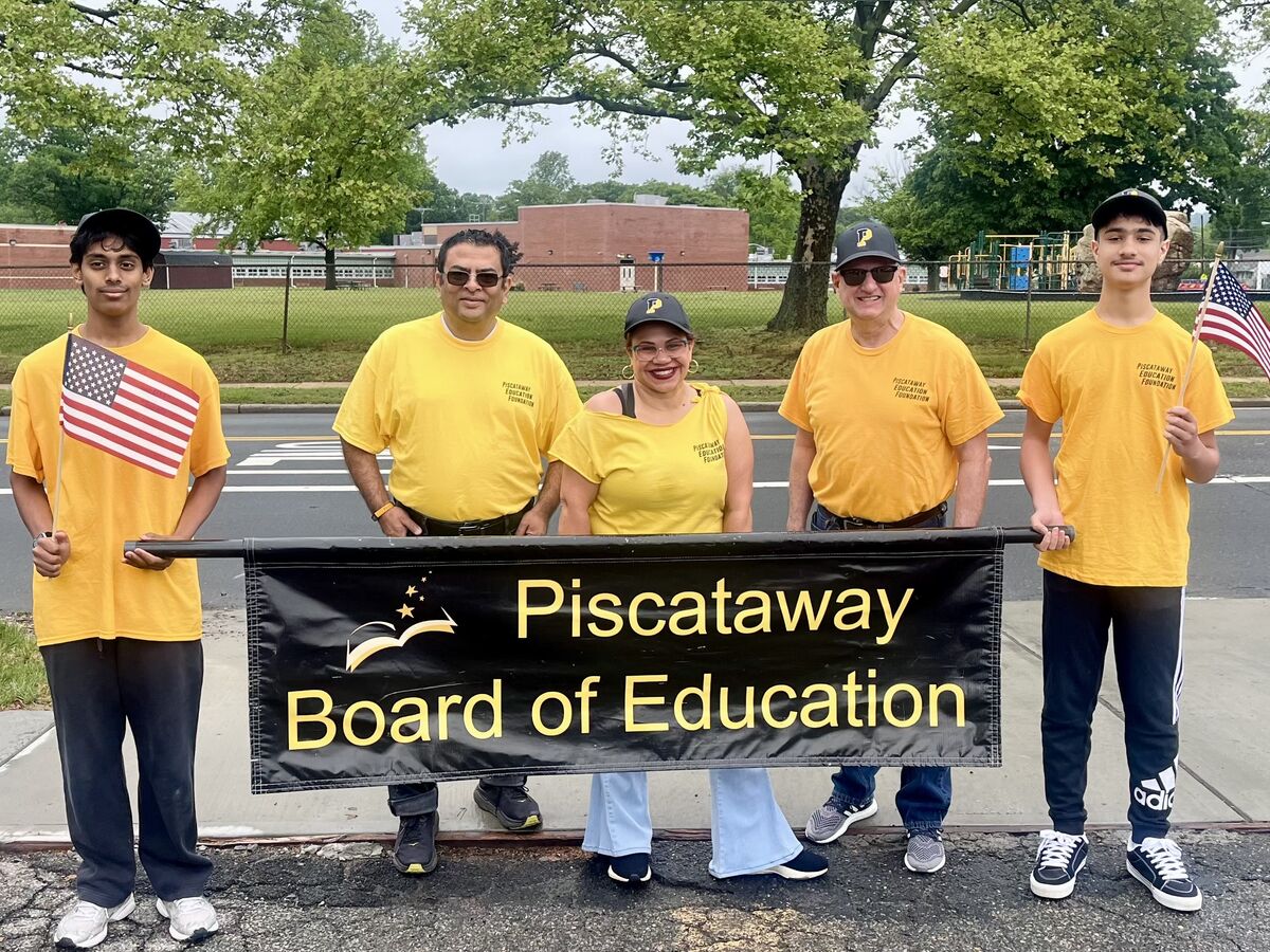 Board members and band on the march in Piscataway Memorial Day Parade