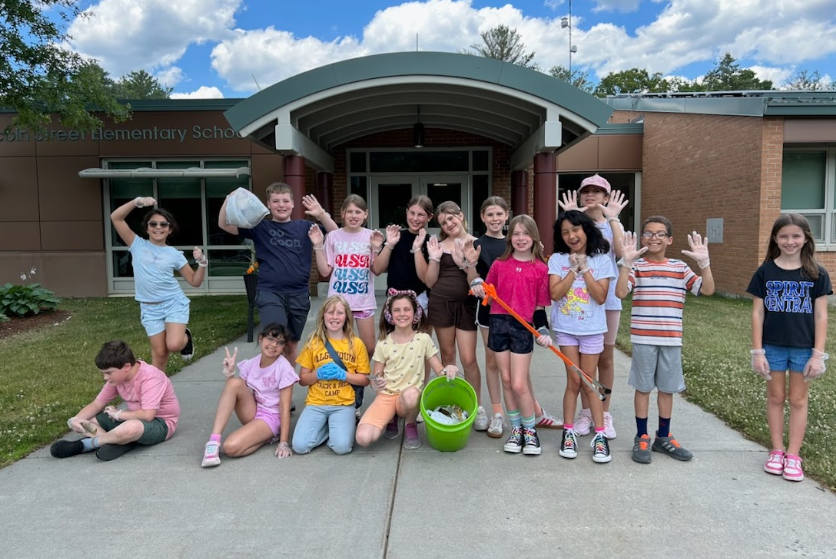 Critter Crew cleaning up the playground at LSS