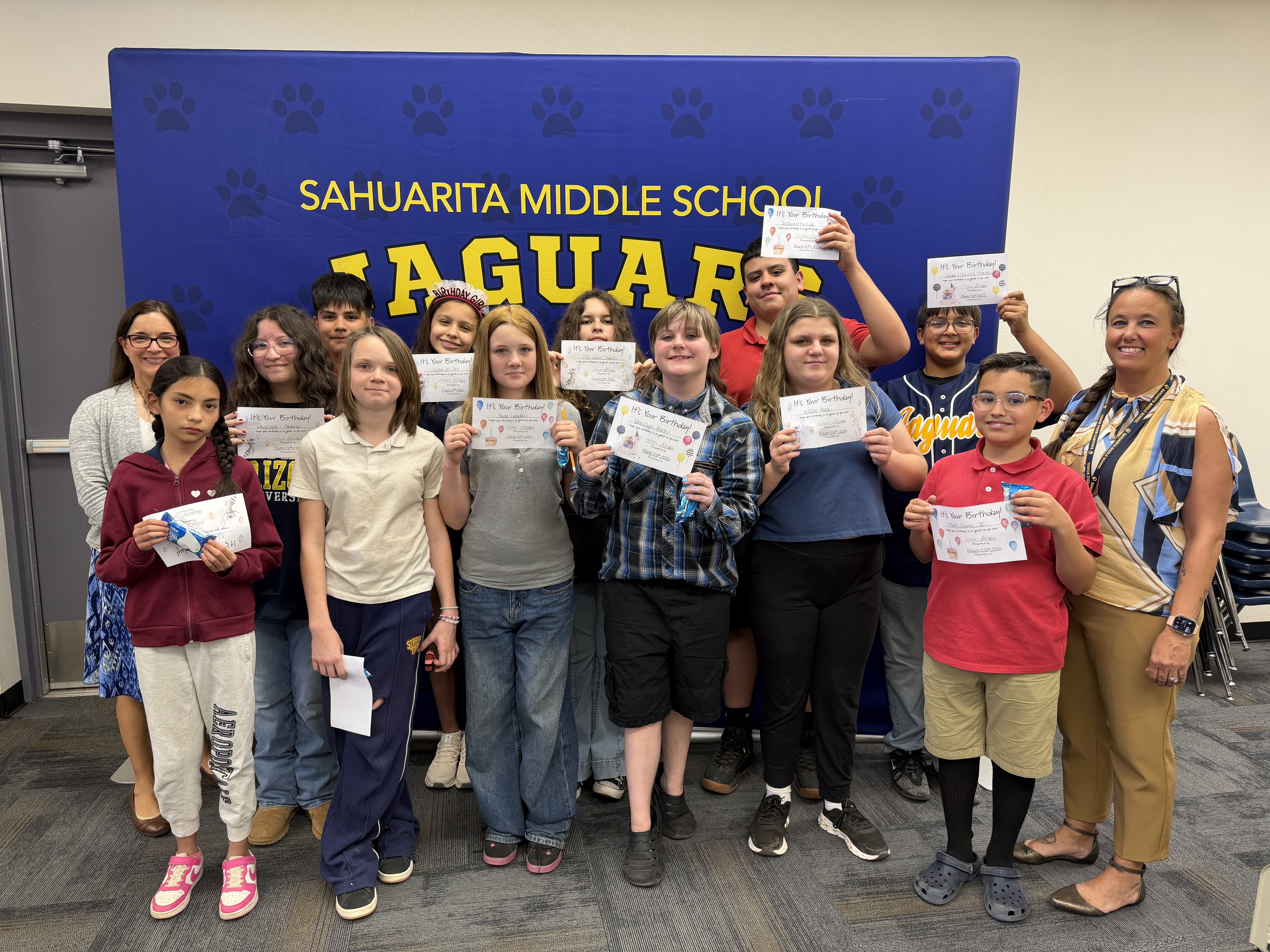 Students with birthday certificates