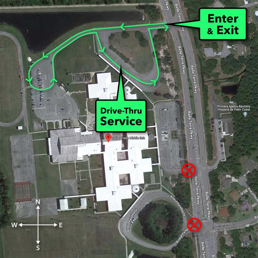 Aerial view of Indian Trails Middle School with a marked drive-thru route and 'Enter & Exit' sign.