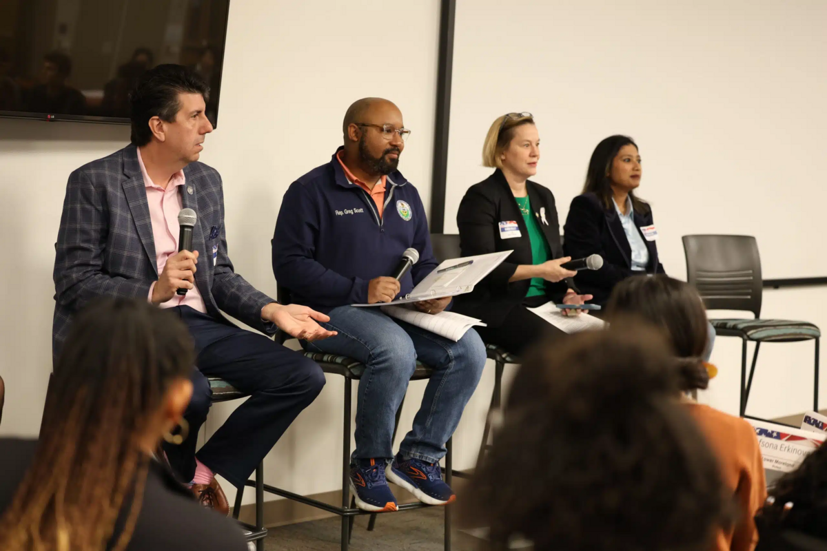 Group of Pennsylvania legislators having a panel discussion with a room of high school students