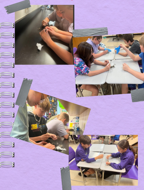 Students engaged in a hands-on science experiment at their desks.