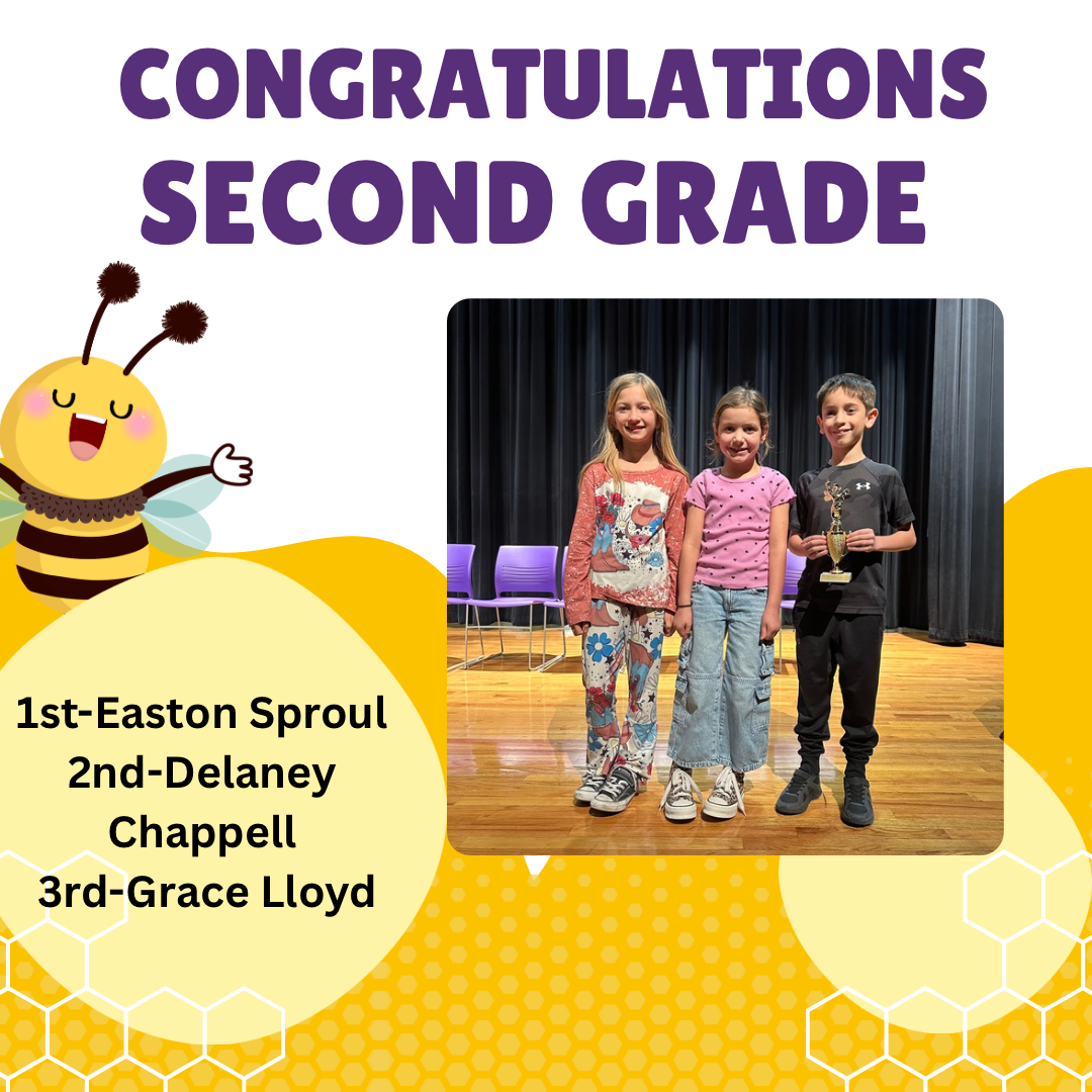Three children stand on a stage, with the boy on the right holding a trophy, celebrating second grade achievements.