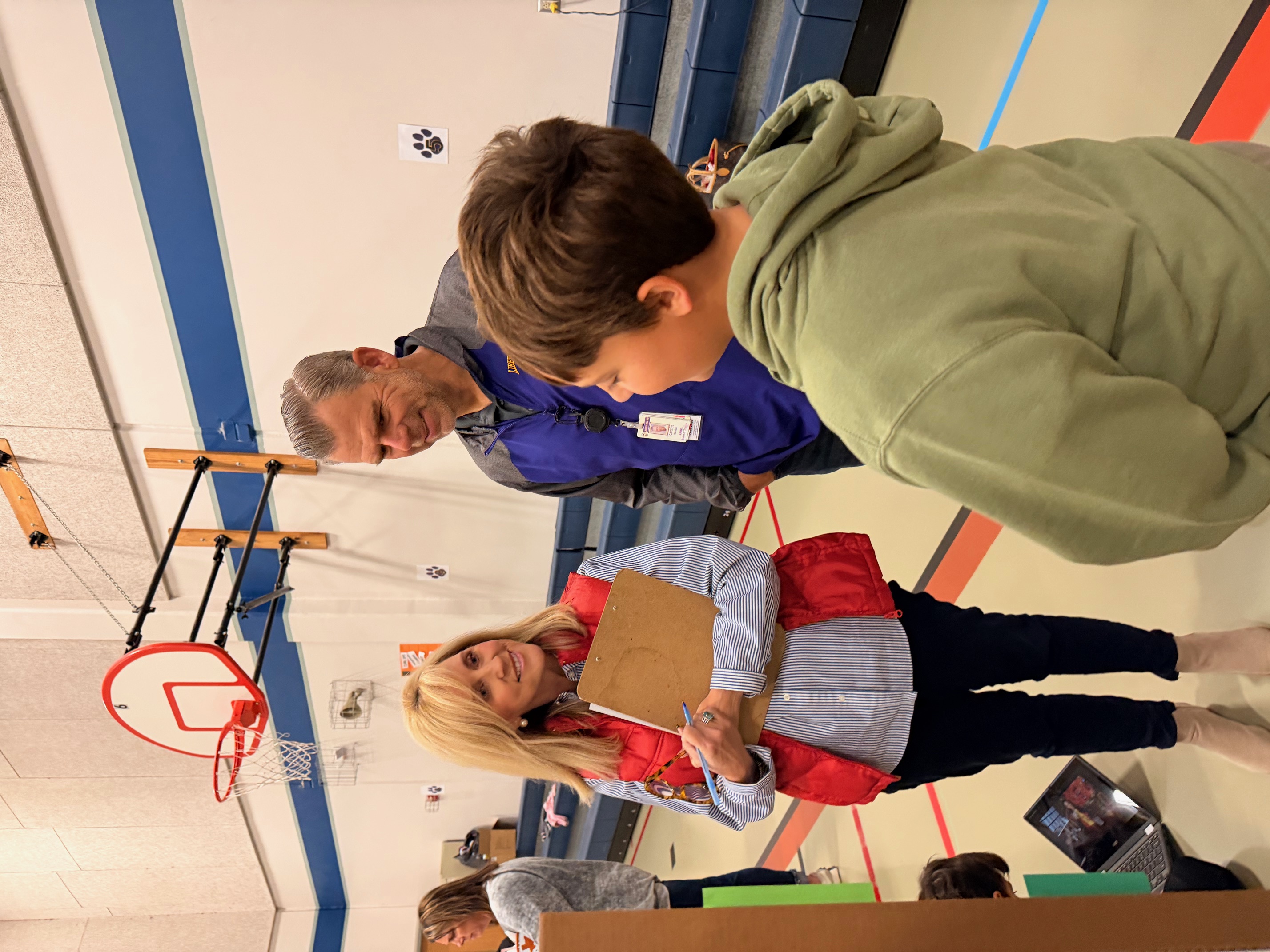 science fair judges with student