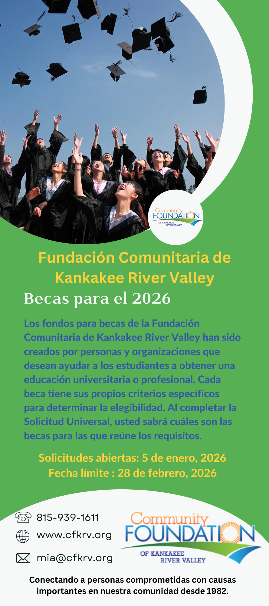 Graduates in caps and gowns toss their mortarboards in the air against a blue sky.