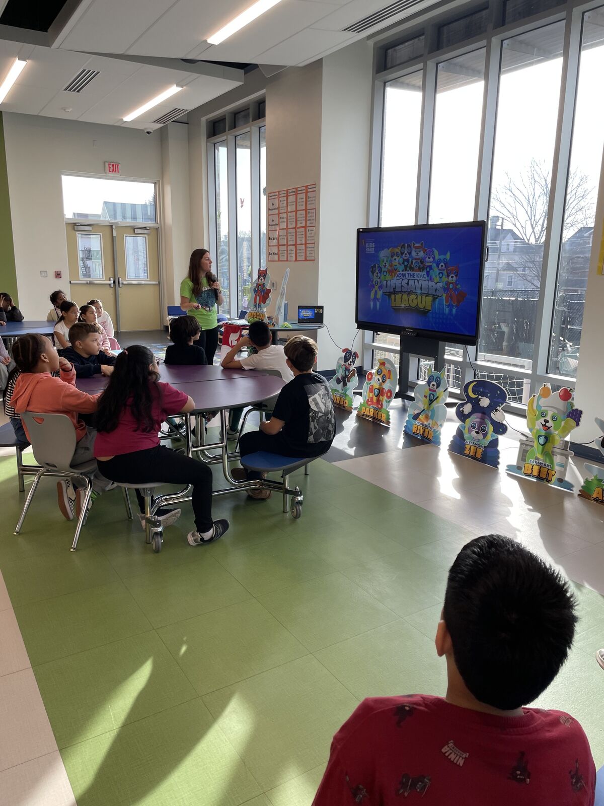 Students listen to a presentation about the Kids Heart Challenge in the newly renovated cafeteria.