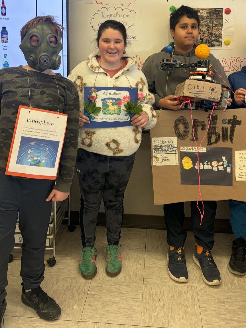 Three students in costume