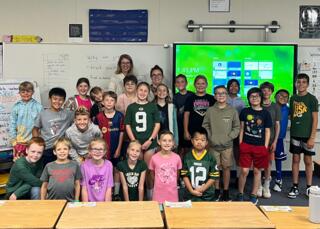 Dr. Prast and Chelsea Girard along with her class