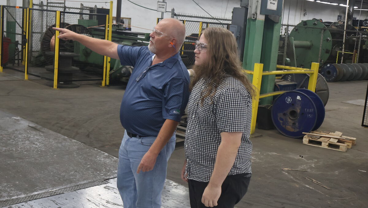 Darrell Being Shown Around The Factory Floor