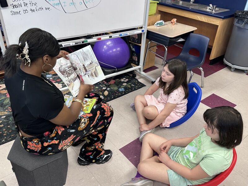 Reading Buddies Connect with DeLuca Students