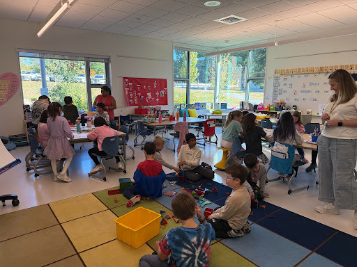 Students work in groups in classroom. 