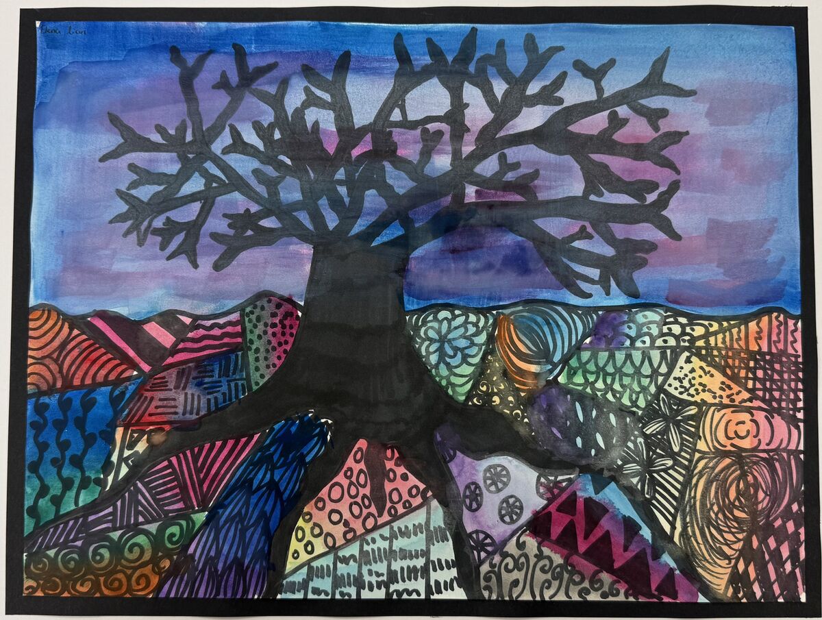 A baren tree sitting on a multicolor landscape
