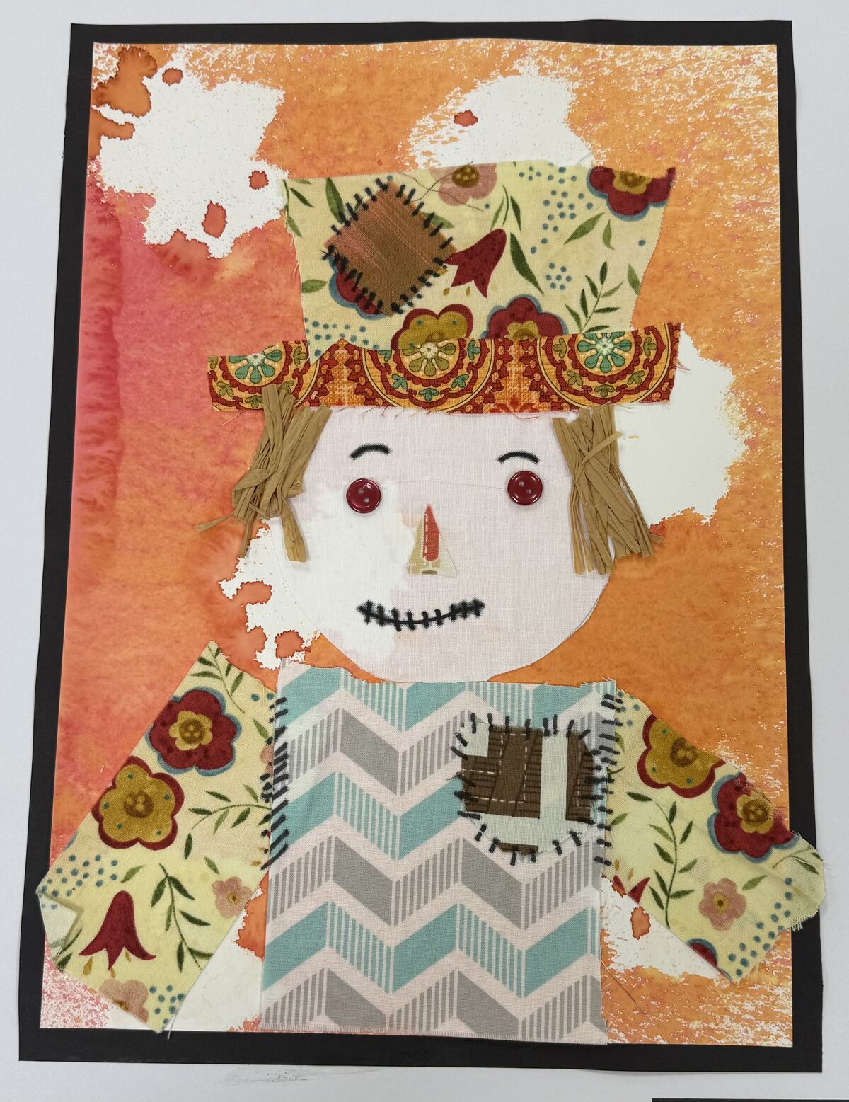 Art project of a scarecrow made out of fabric material