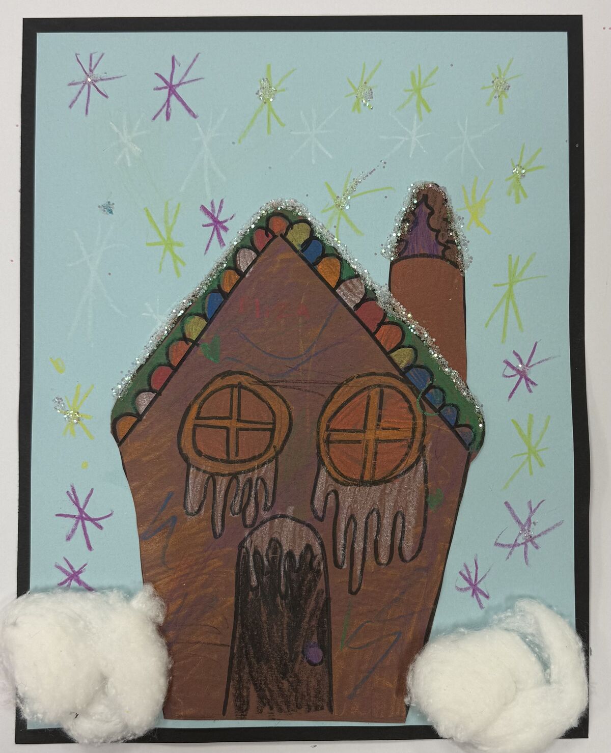 A brown cottage sitting in front of a blue background with multi colored stars.