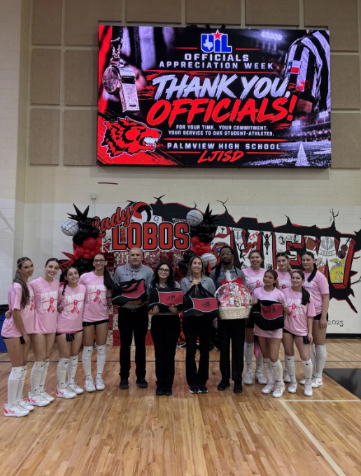 A group of volleyball players and staff pose in a gym beneath a large digital screen reading "Thank You Officials! Palmview High School LJISD."
