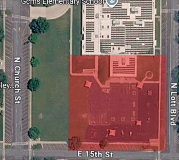 Aerial view of Gcms Elementary School with N Church St and N Lott Blvd visible.