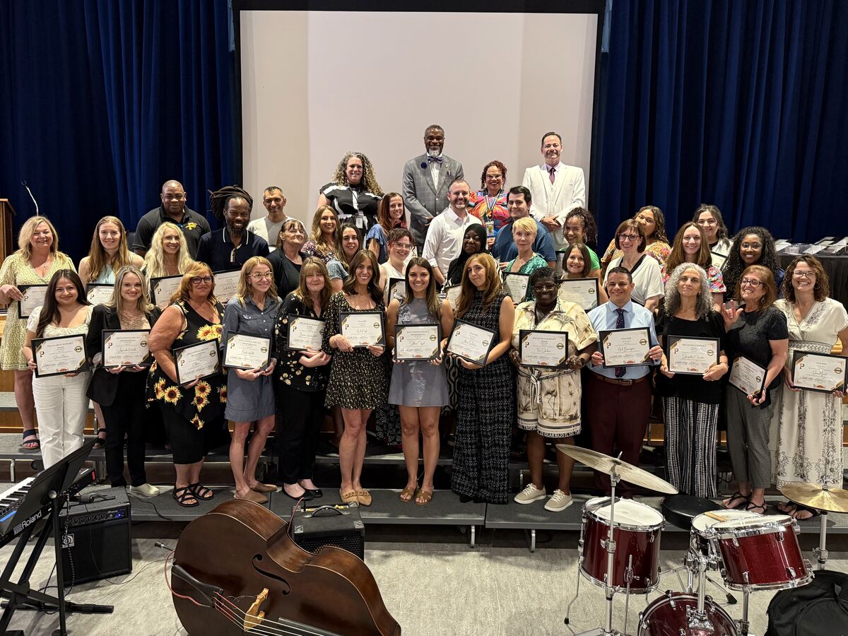 Staff Members of the Year honored before families and colleagues