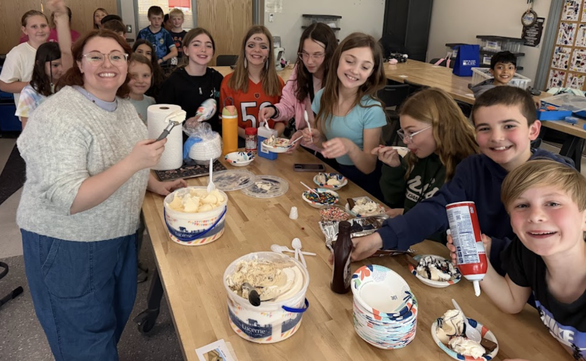 Students and teachers enjoying a make your own sundae bar