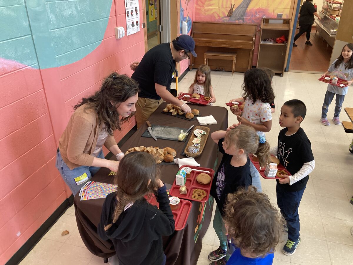 Taste test draws rave reviews of wheat roll, stickers from Mill Road students