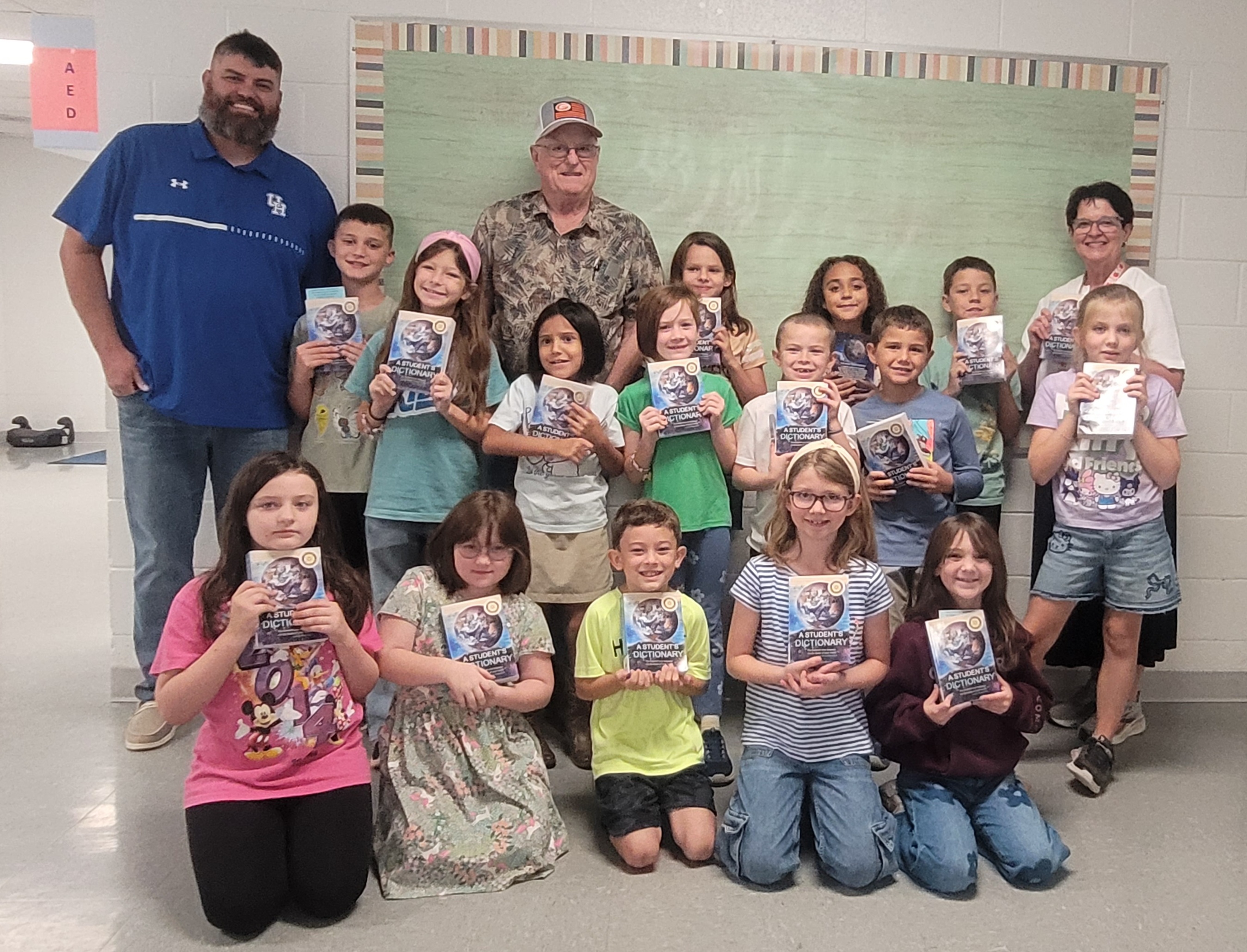 Gilmer Rotary Club presents Dictionaries to 3rd Graders!