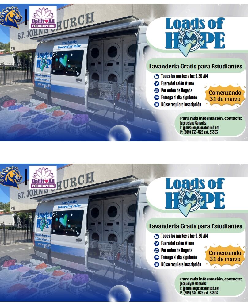 A mobile laundry van, 'Loads of Hope,' is parked outside St. John's Church, offering free laundry services for students.