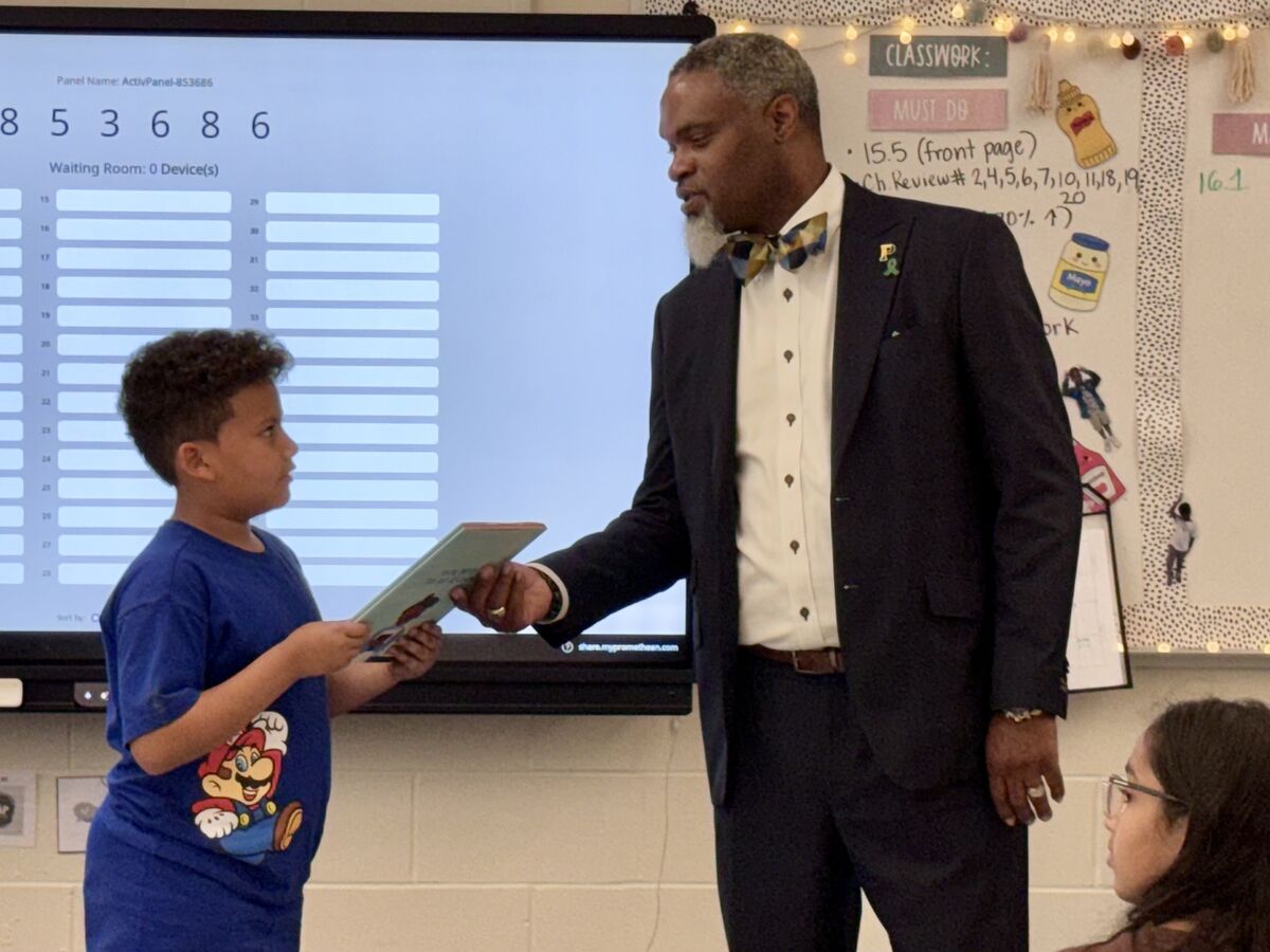 Superintendent Glover delivers books to keep Read Across America promise