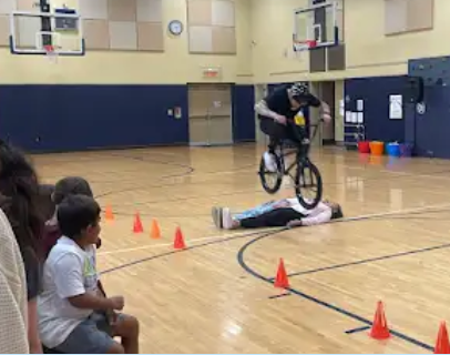 BMXer jumped over 2 staff members