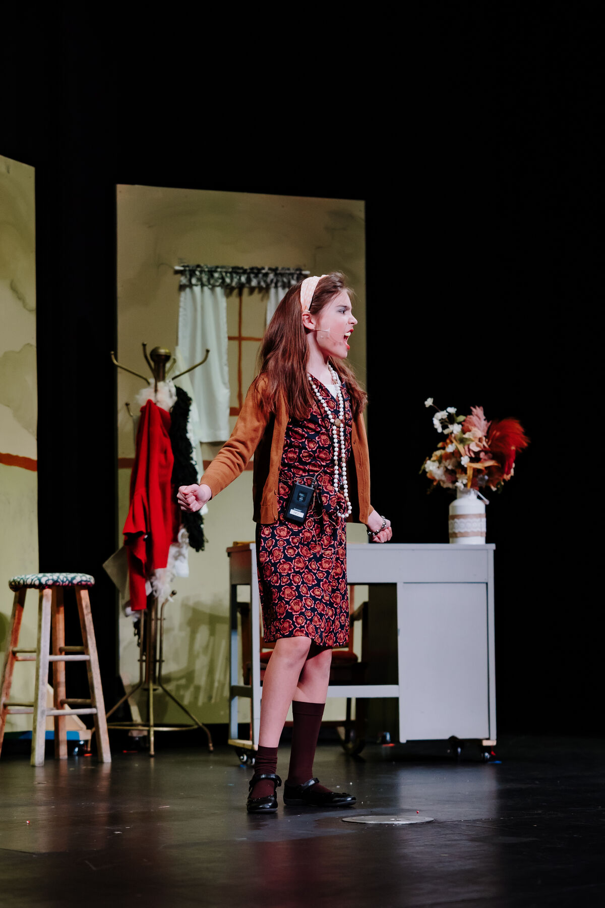 Child shouting during a perormance on stage