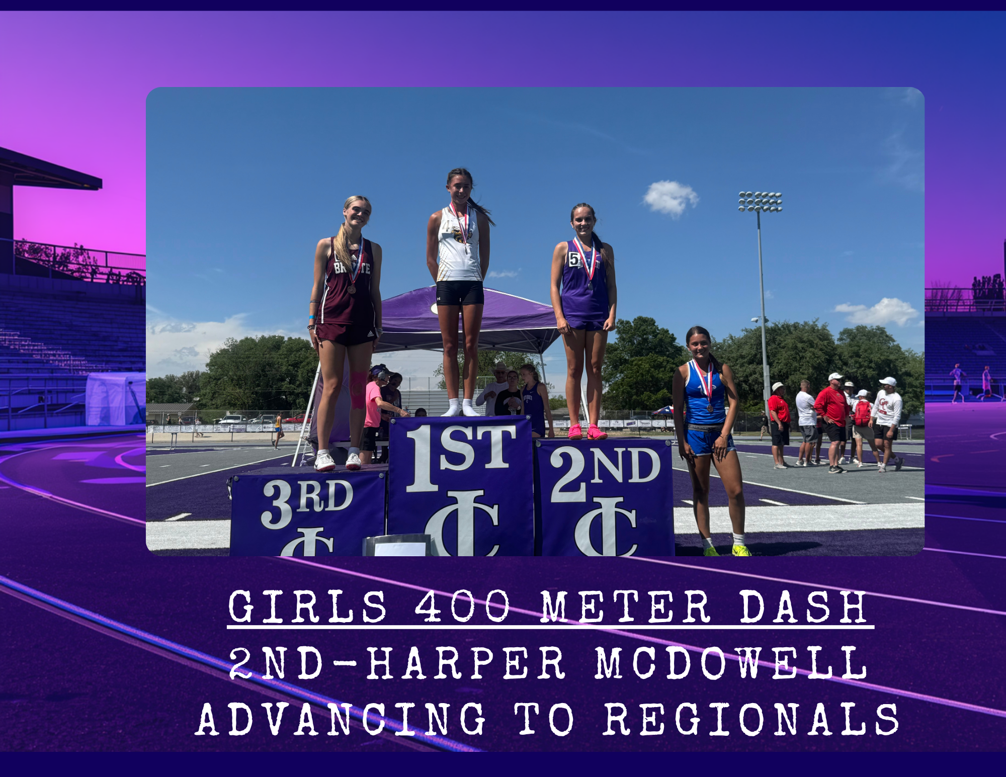 Three young women stand on a podium, receiving medals for the Girls 400 Meter Dash.