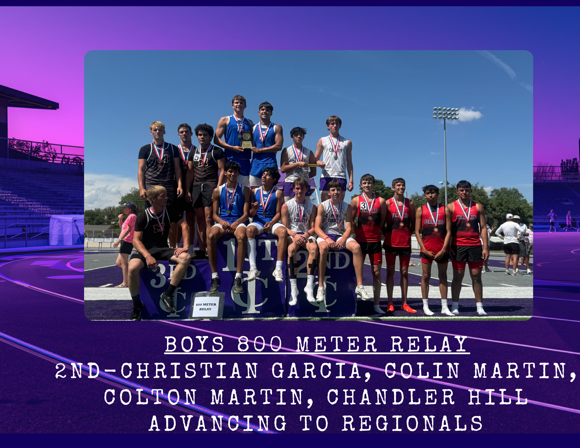 A group of young male athletes in track uniforms stand on a podium, wearing medals and holding a trophy.