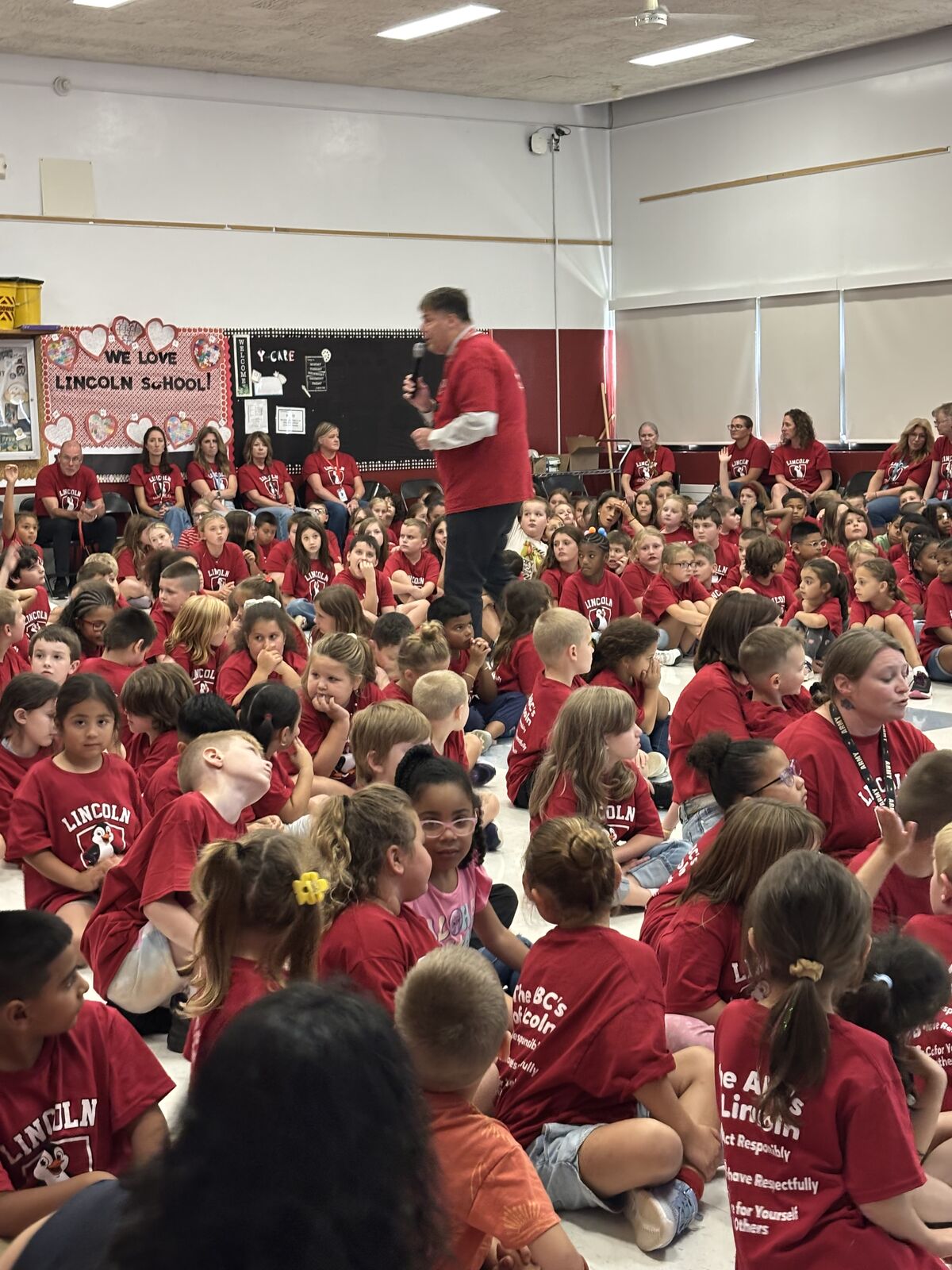 Mr. Geniti walks through the sea of students