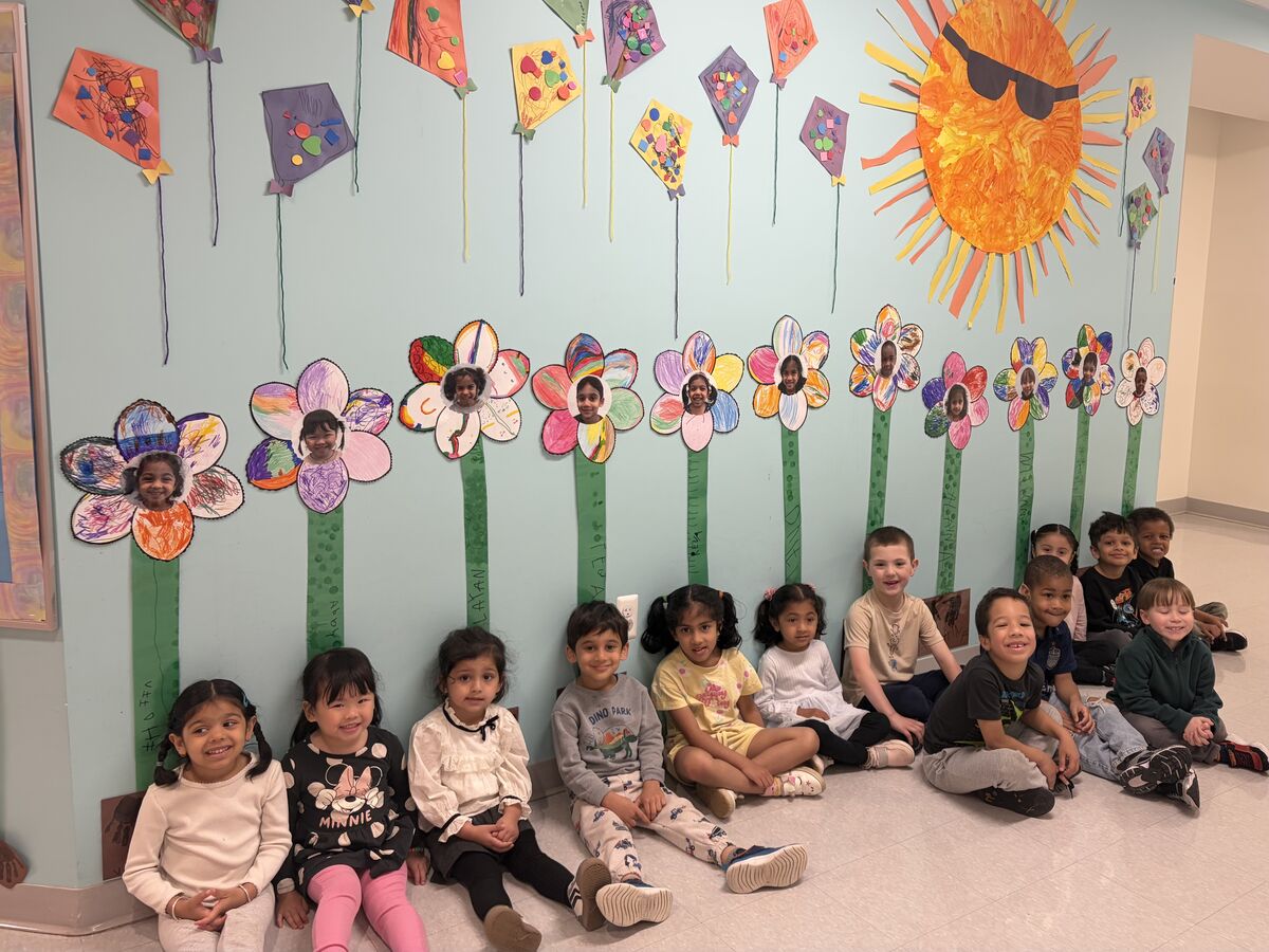 Preschoolers tend their hallway garden with creativity and cooperation