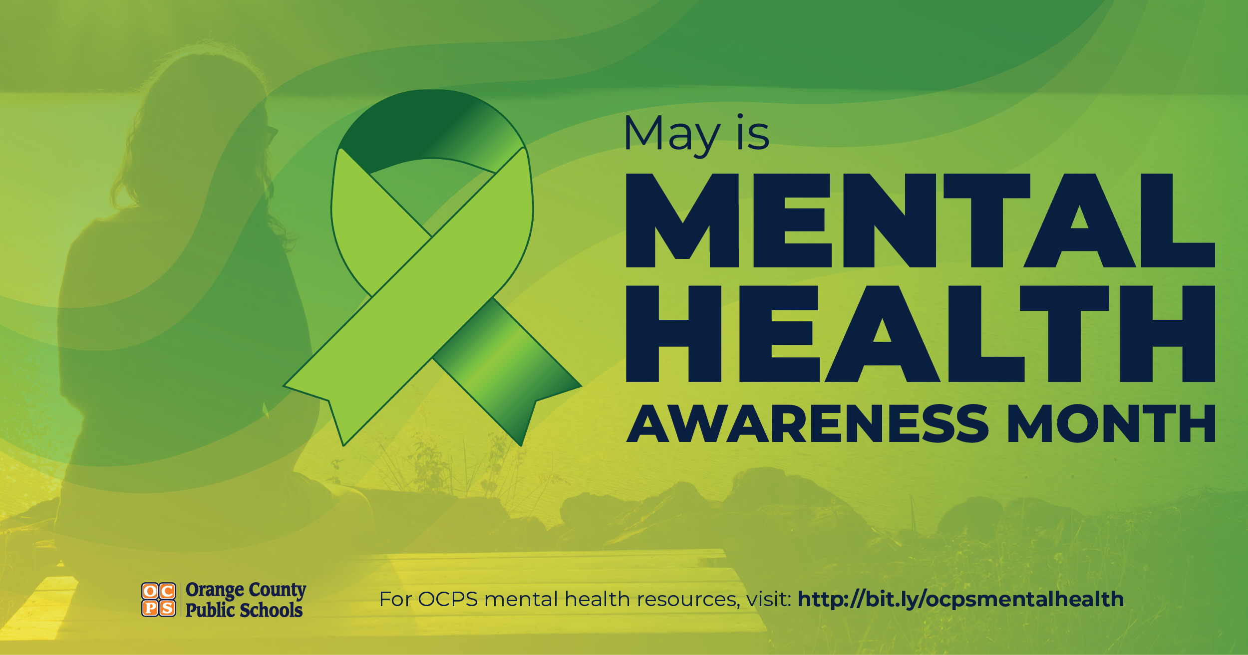 A green ribbon, a symbol for mental health awareness, is displayed with text stating 'May is Mental Health Awareness Month'.