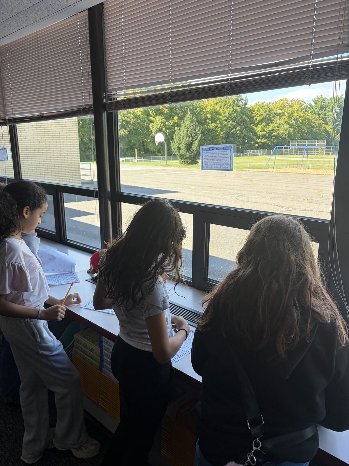 Fifth Graders Preparing for their Weekly Reading Check-in