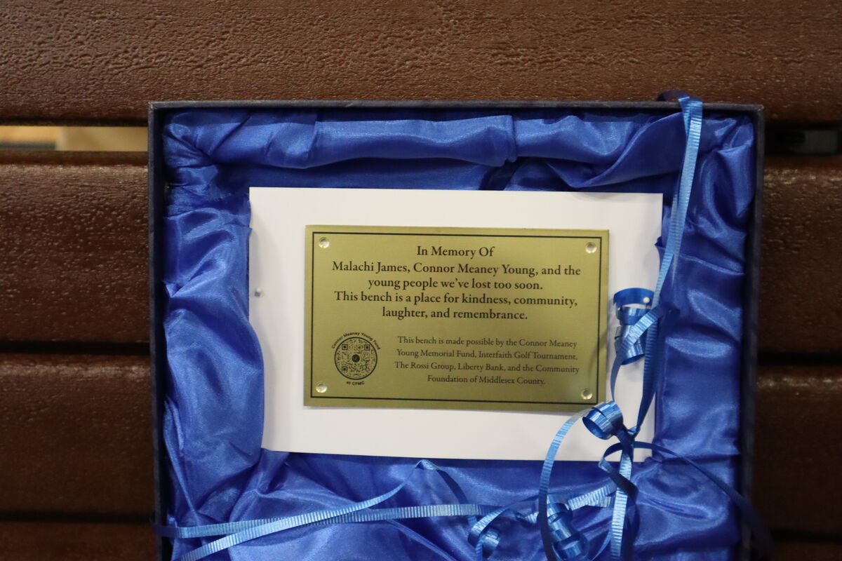 A close-up view of the plaque that will be installed on the buddy bench