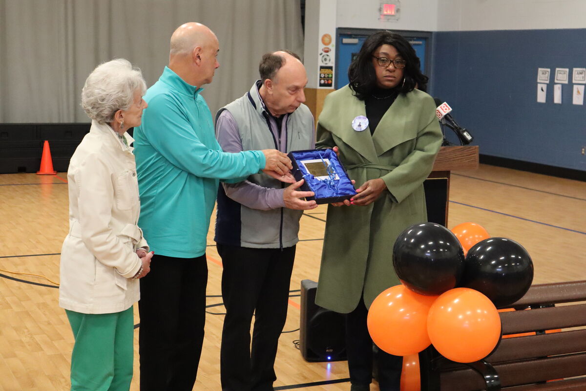 A plaque delivered to the family of Malachi James that will be installed on the buddy bench