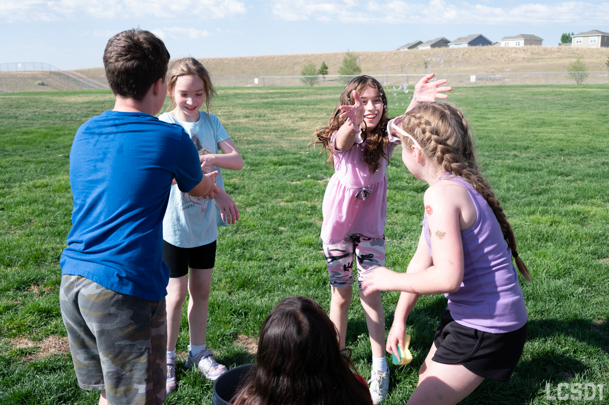Summer School and Jumpstart students celebrate with a field day