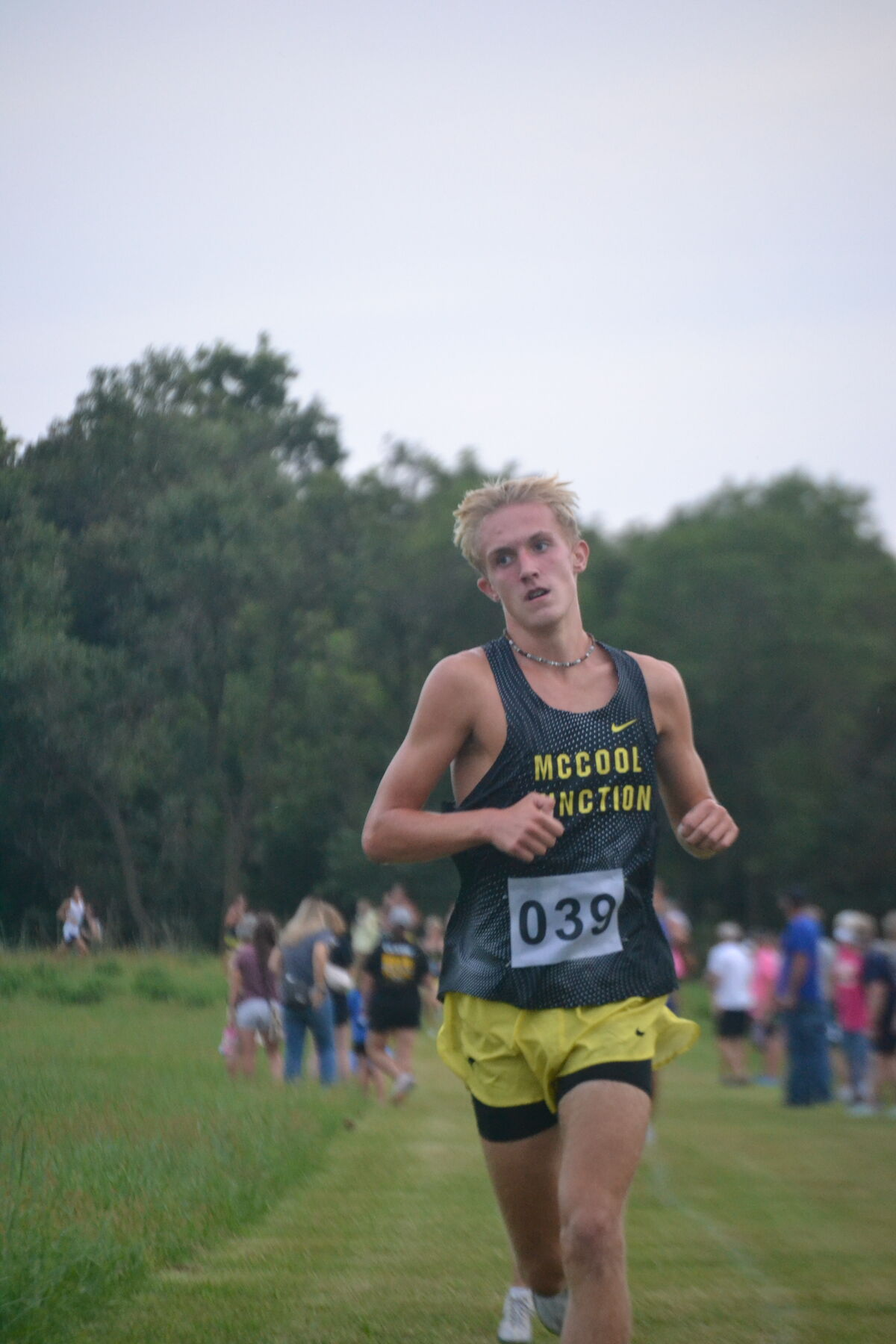 Sophomore Carter Mierau races to the finish line at McCool's 3K Meet.