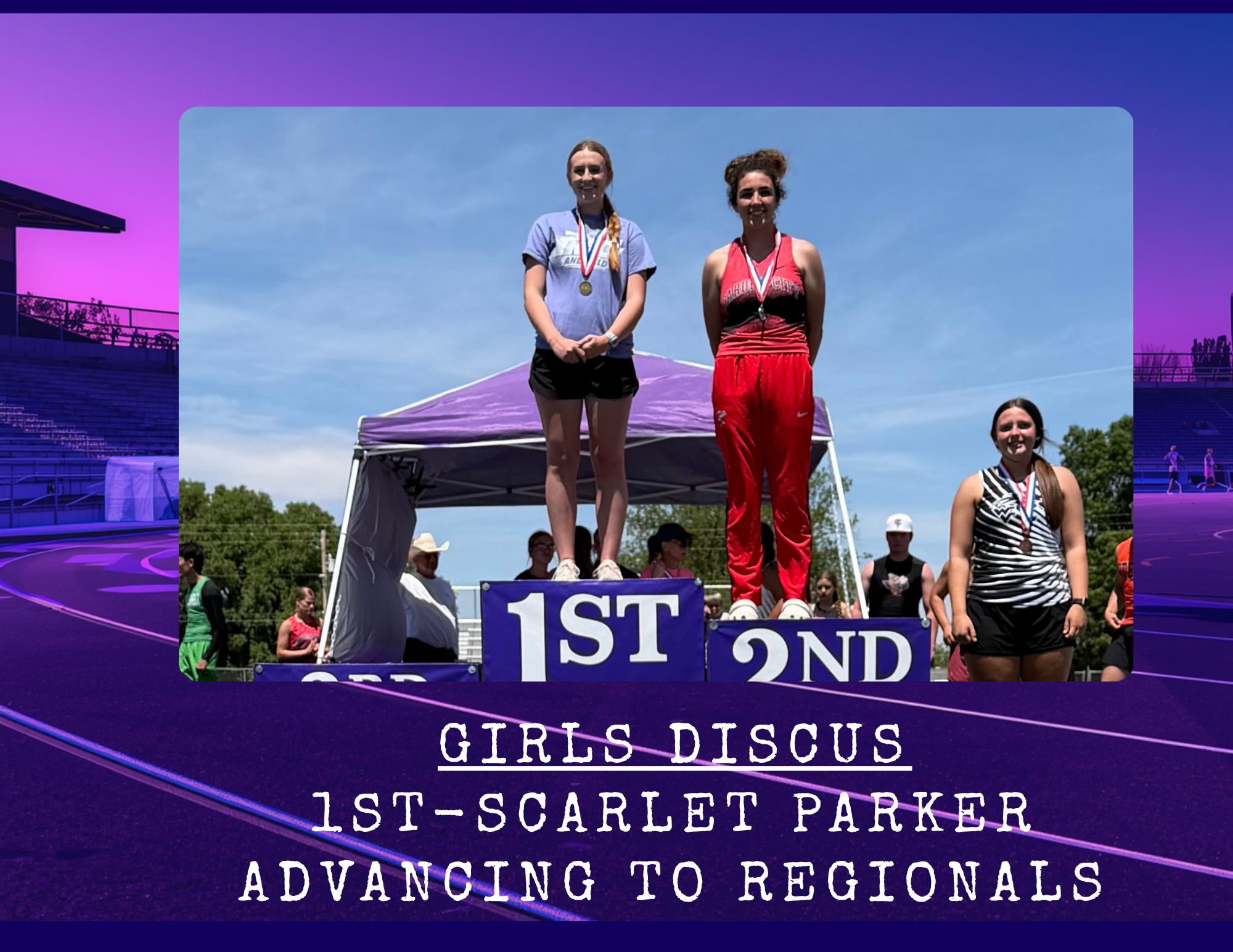 Three girls stand on a podium, receiving medals for the Girls Discus event.
