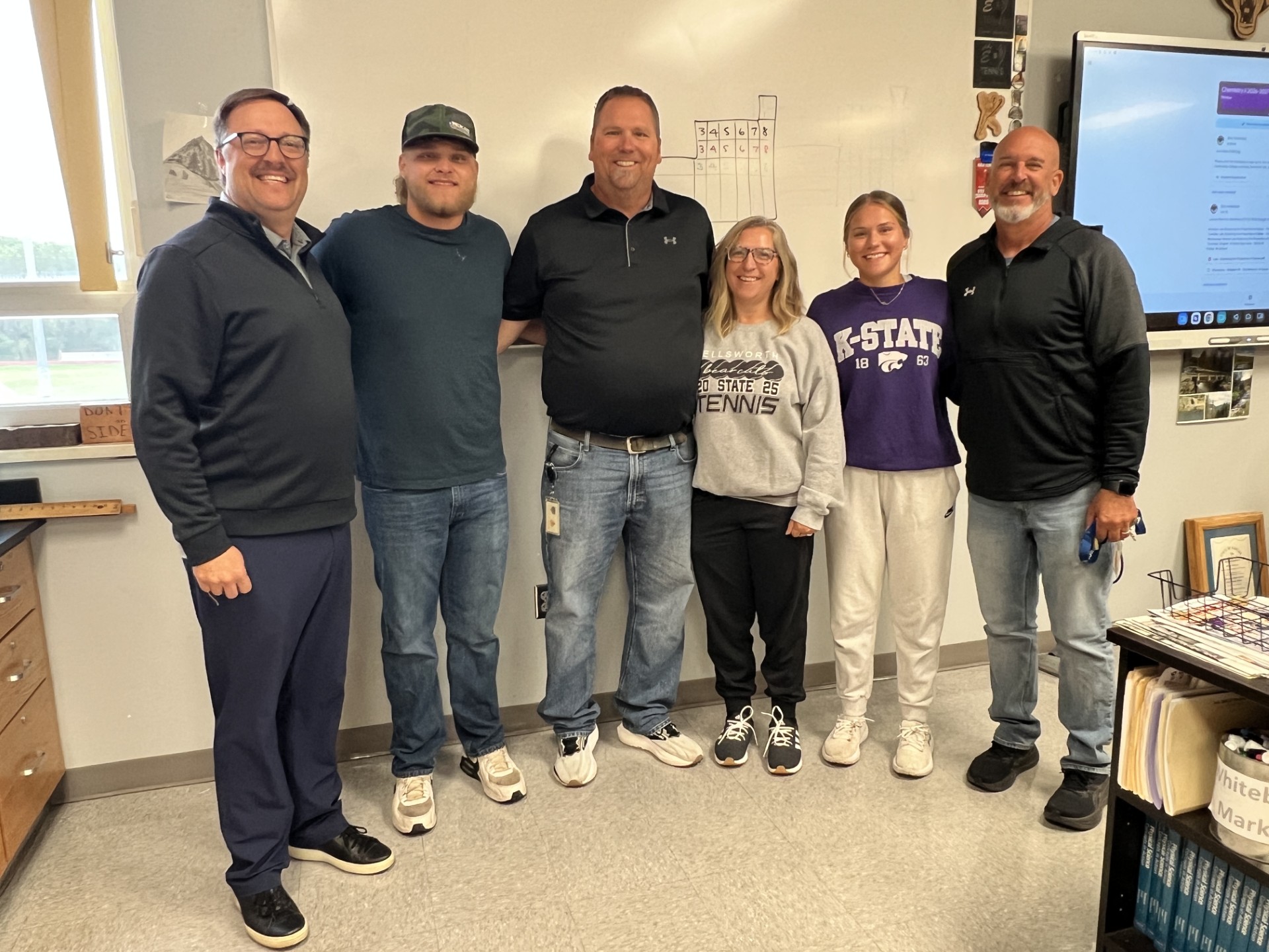 Eric Anderson with family and Staff