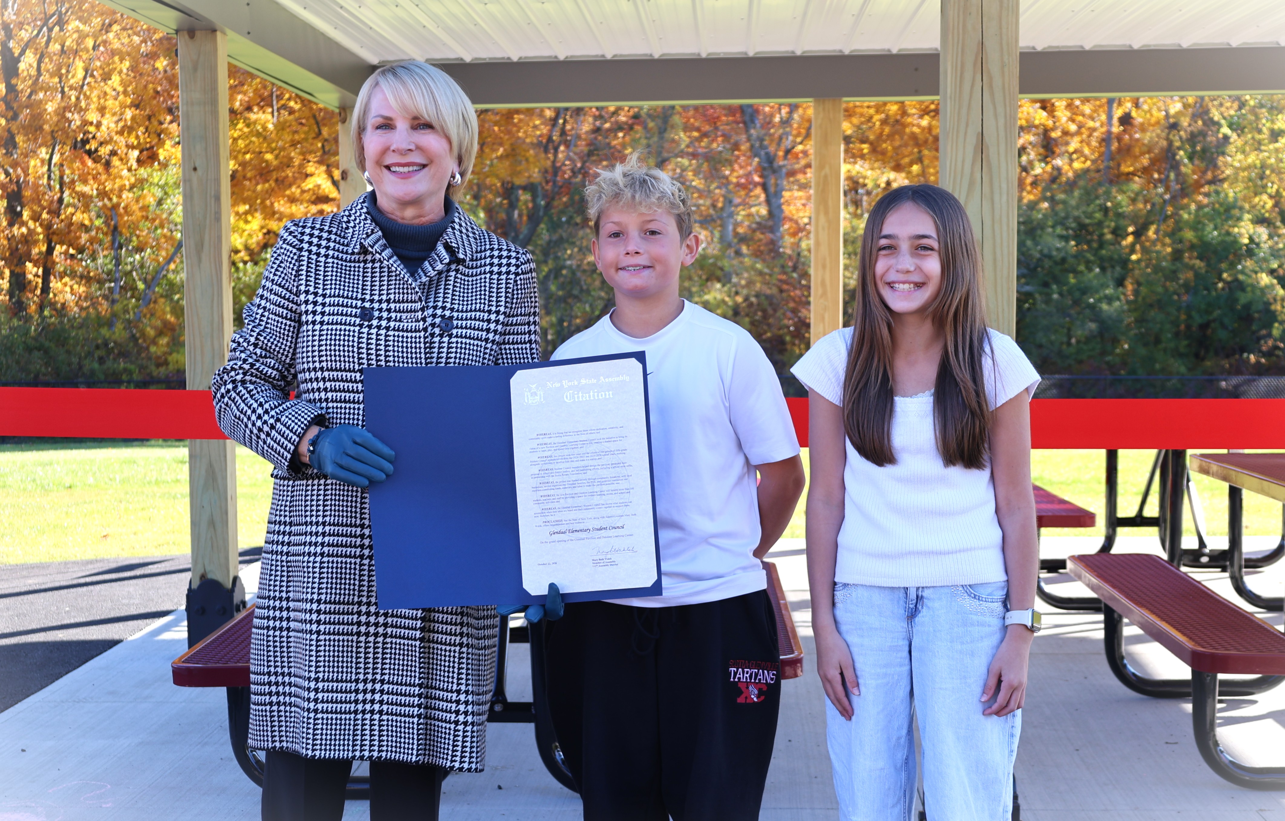 Asseblywoman Mary Beth Walsh gives citation to students at gathering