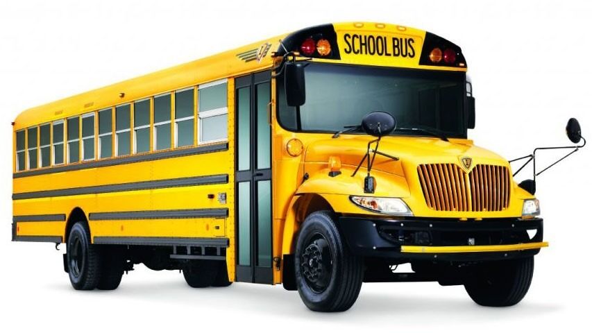 A bright yellow school bus with 'SCHOOL BUS' text on the front.