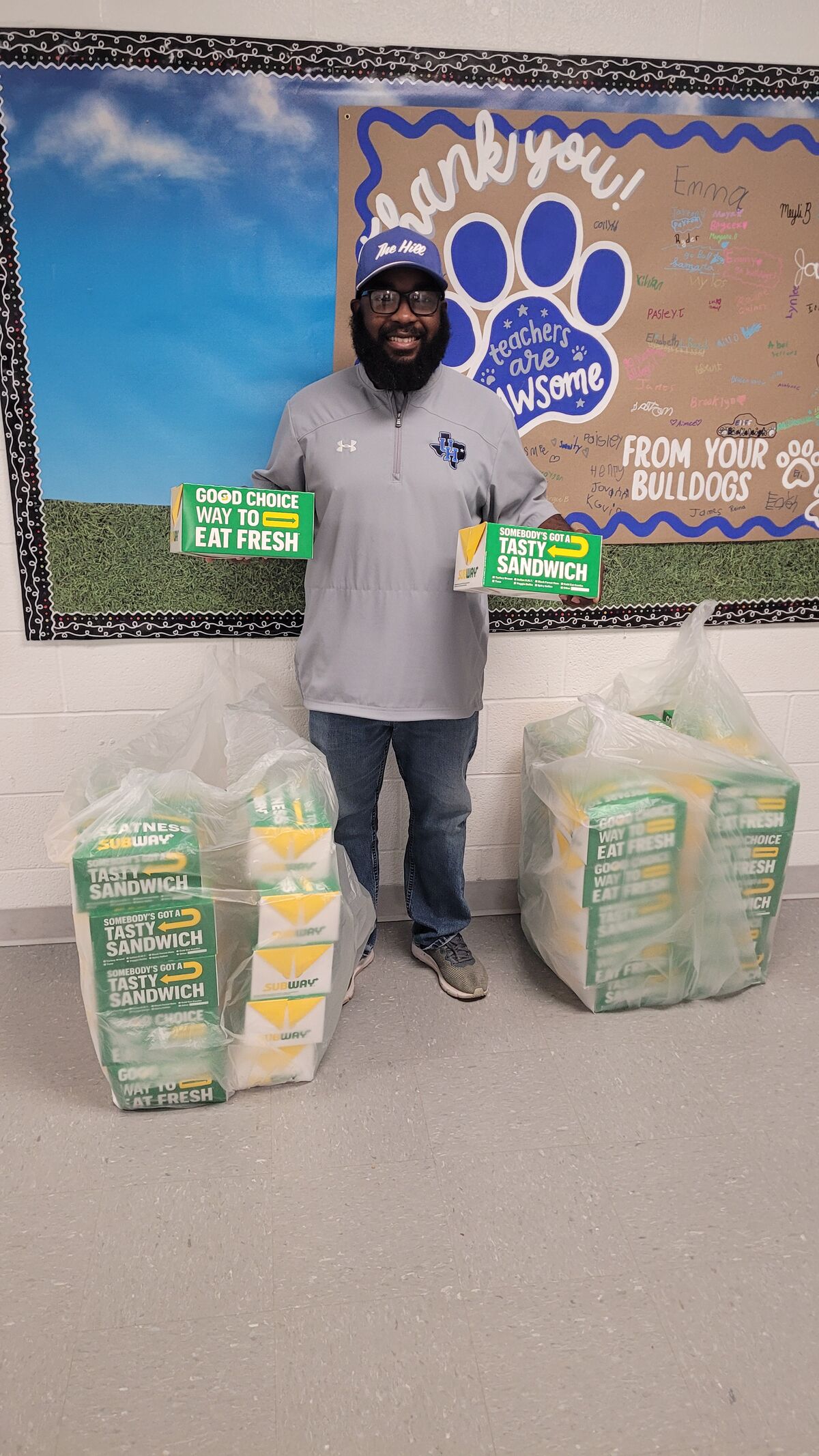 Coach Fuller with the subway lunch that was anonymously donated to our staff for Teacher Appreciation!  Thank You!!!