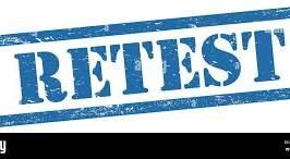 A blue, distressed stamp with the word 'RETEST' in bold, capitalized letters.