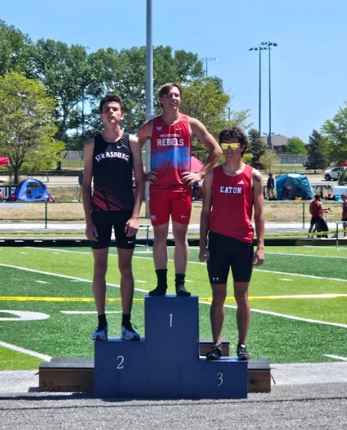 Cody standing at the top of the podium for 300 Hurdles