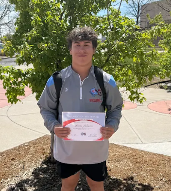 Lucas Johann Holding his award