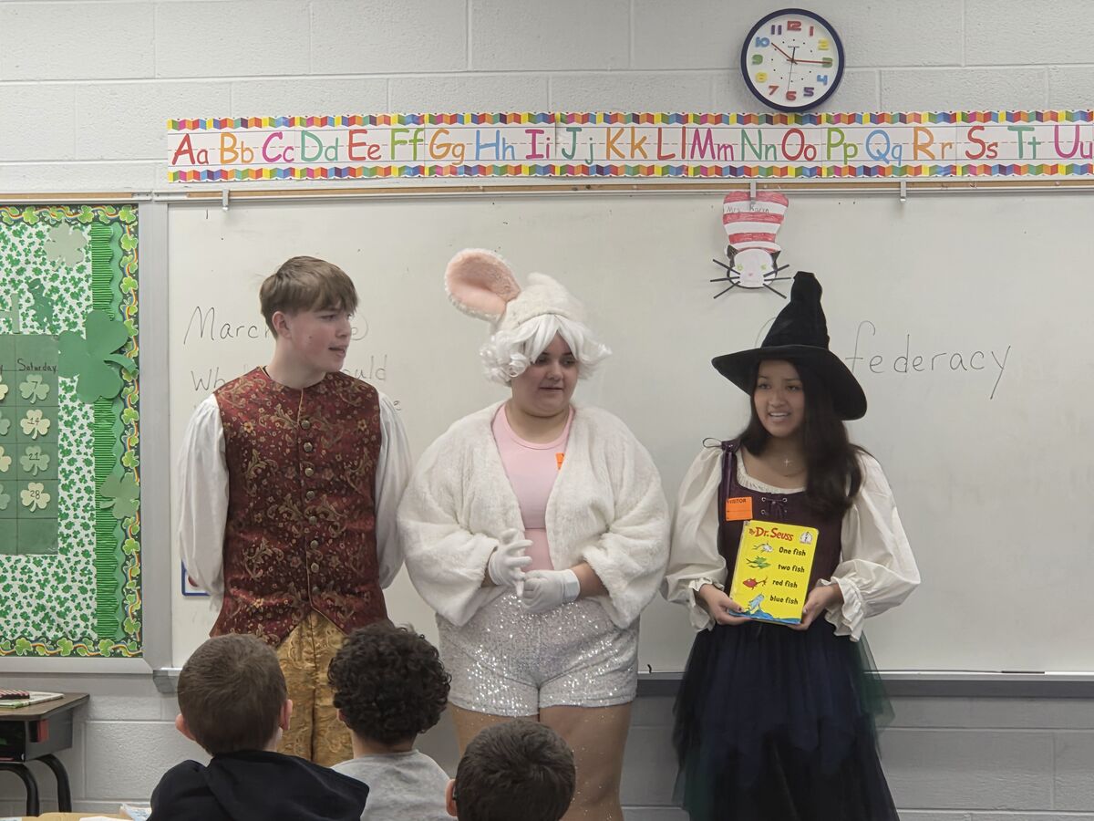 Third Grade being read to by the 3 members of the cast from Shrek the Musical.