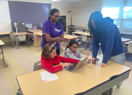 Students working on coding.