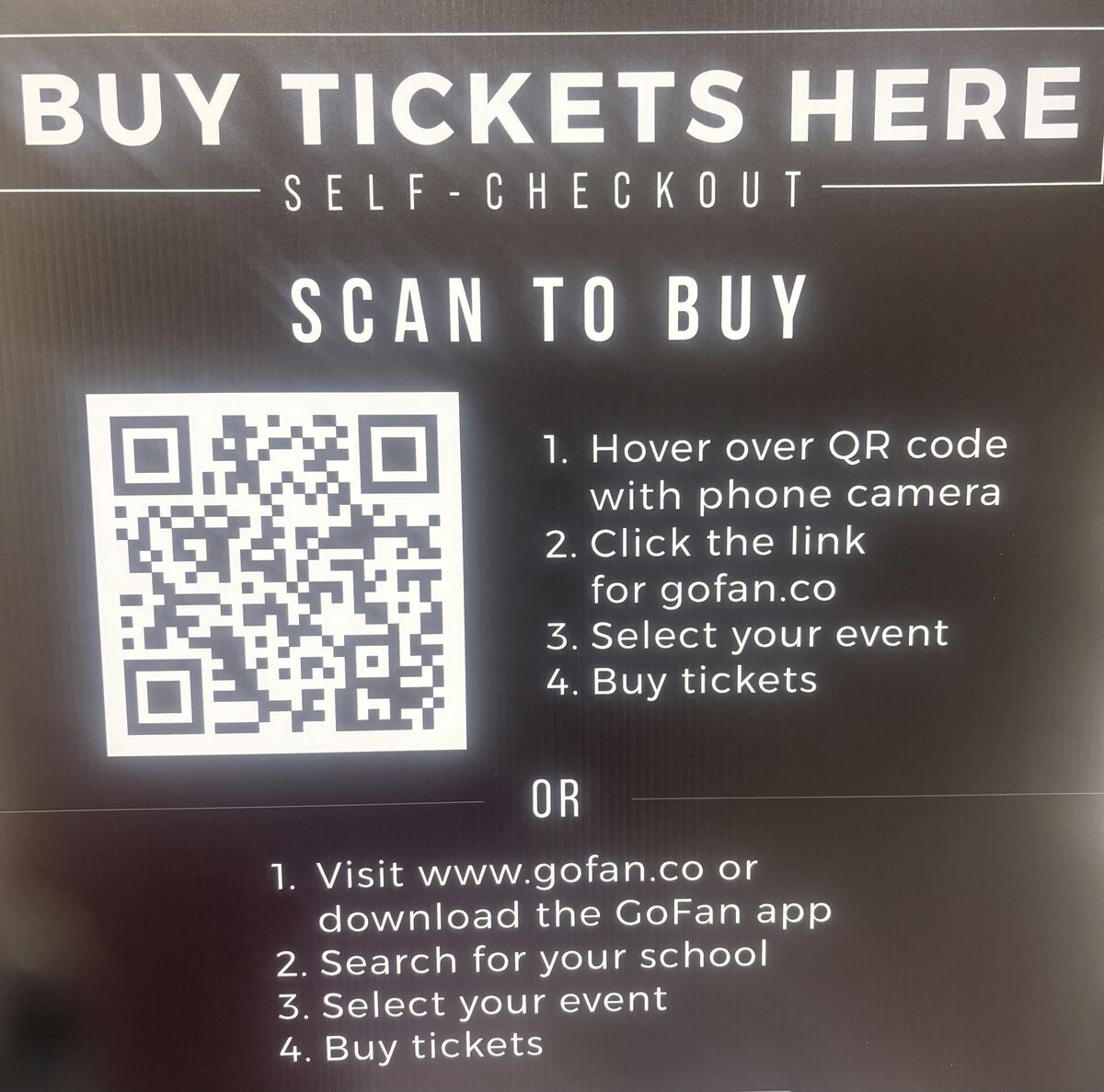 A sign reads 'BUY TICKETS HERE' with a QR code and instructions to scan and buy online via gofan.co.