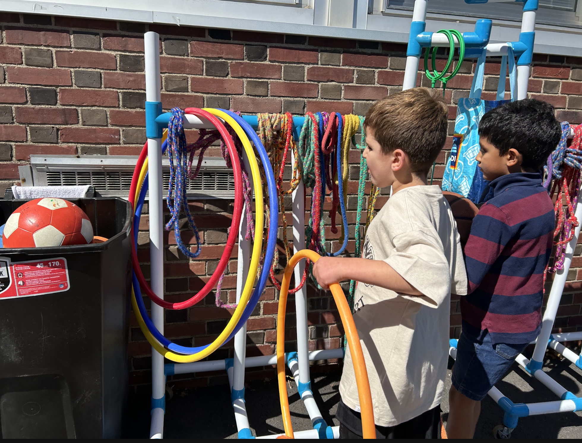 Student picking up after recess